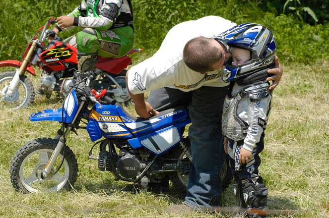 Contestants of all ages compete in a motorcycle hill climb race