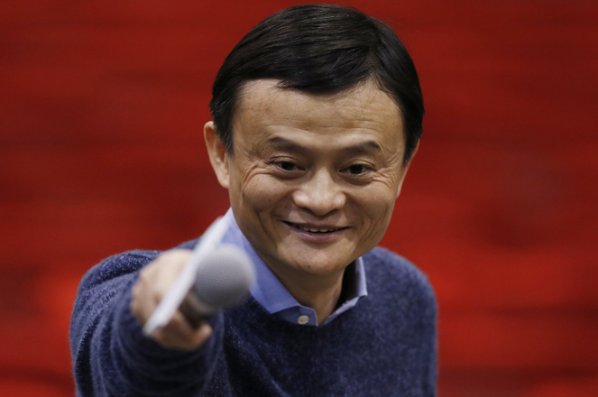 Alibaba Group Executive Chairman Jack Ma points to a reporter after a speech on Transforming Dreams into Successful Business to inspire young people to develop their creativity and entrepreneurship by using modern technology in Hong Kong Monday, Feb. 2, 2015. E-commerce giant Alibaba pledged last Friday to do more to fight online sales of counterfeit goods, quickly settling a public dispute with a Chinese regulator after the value of its U.S.-traded shares plunged. (AP Photo/Kin Cheung)