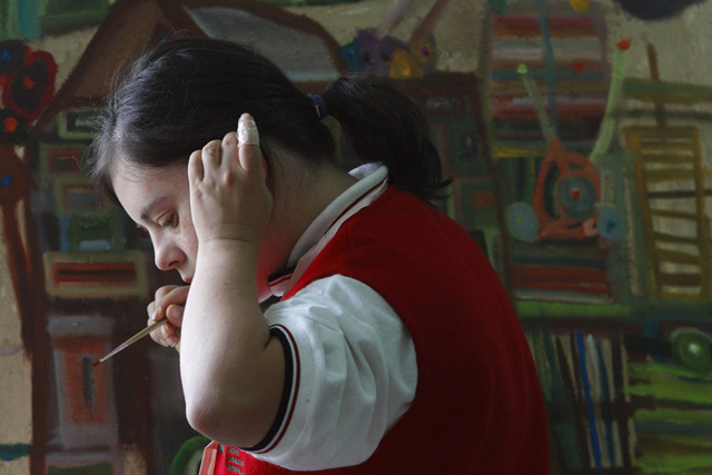 **APN ADVANCE FOR FEB. 10** Maria Soto paints in a studio at the Mexican School of Down Art in Mexico City, Friday, Oct. 19, 2007. The Mexican School of Down Art, where all the students have Down syndrome, is working to abolish preconceptions about what mentally disabled people are capable of, particularly in the developing world where resources for the handicapped are scarce and many struggle to be treated with dignity.