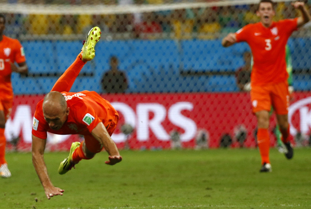Arjen Robben of the Netherlands is fouled during their 2014 World Cup quarter-finals against Costa Rica at the Fonte Nova arena in Salvador
