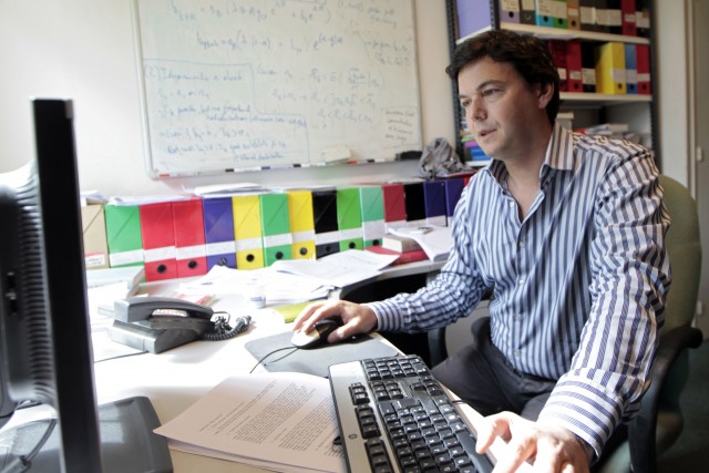 French economist Thomas Piketty works in his office in Paris