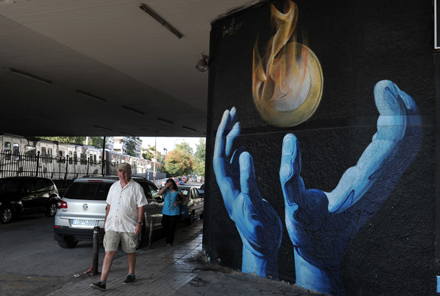 Griechenland kann die EU-Schulden nicht nach wie vor nicht zurückzahlen: Wandbild in Athen (27. September 2013). (AFP/ Louisa Gouliamaki)