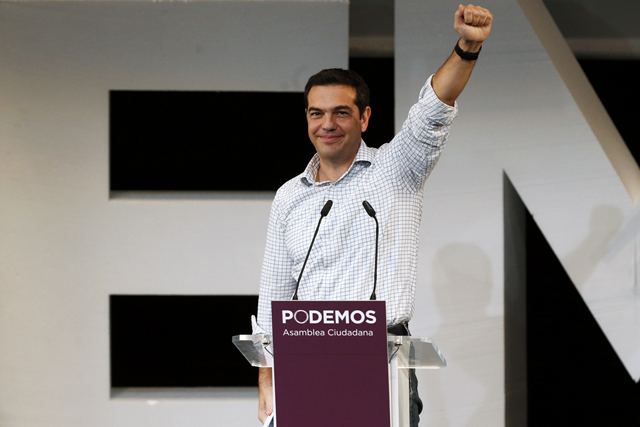 Alexis Tsipras, leader of Greece's Syriza party gestures during a meeting in central Madrid