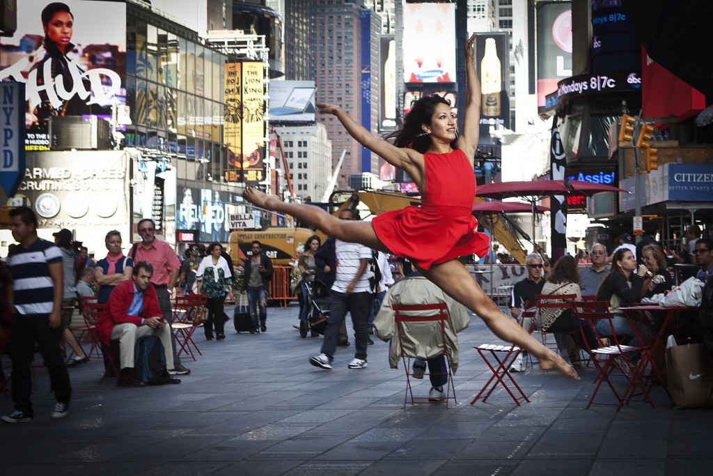A dancer poses for a photograph as part of the "Dance as Art" photo project in Times Square in New York