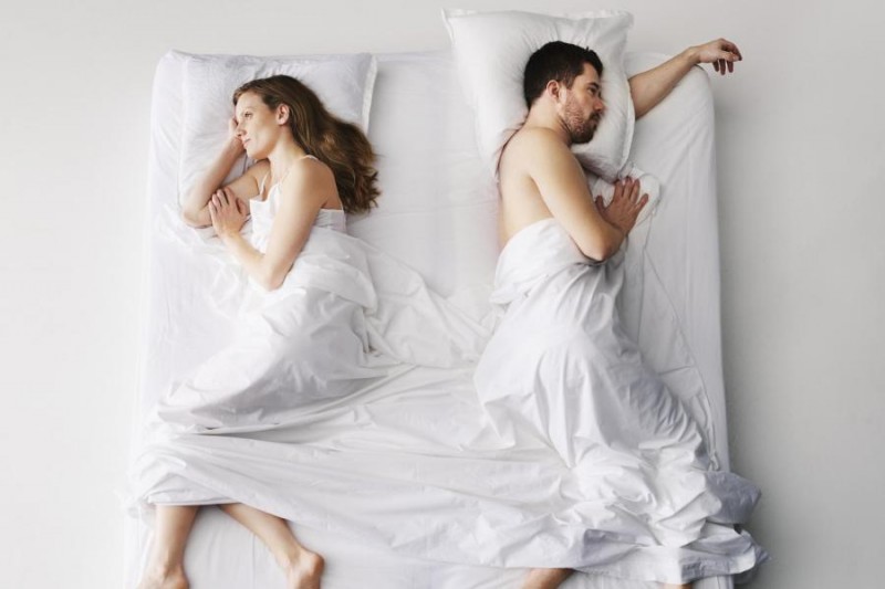 Mid-adult-couple-sleeping-in-bed-elevate-1