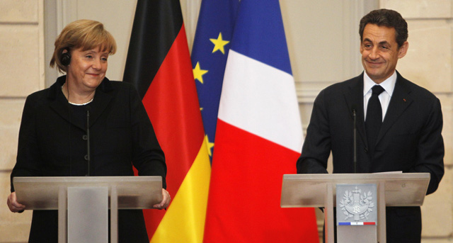Angela Merkel und Nicolas Sarkozy geben sich optimistisch.