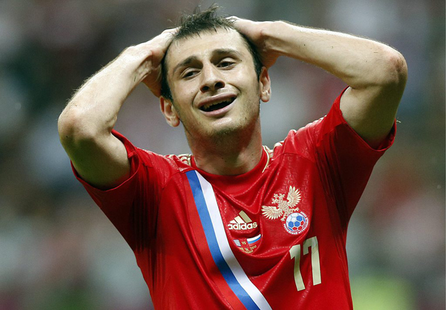epa03268888 Alan Dzagoev of Russia reacts after missing a chance during the Group A preliminary round match of the UEFA EURO 2012 between Greece and Russia in Warsaw, Poland, 16 June 2012.  EPA