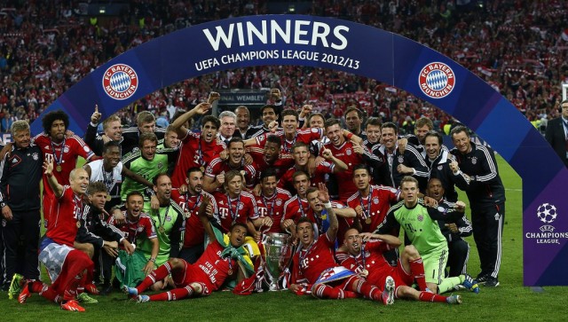 Bayern Munich FC team pose with their trophy and celebrate after the UEFA Champions League final between Borussia Dortmund and Bayern Munich at Wembley Stadium in London, Britain, 25 May 2013. EPA/KERIM OKTEN
