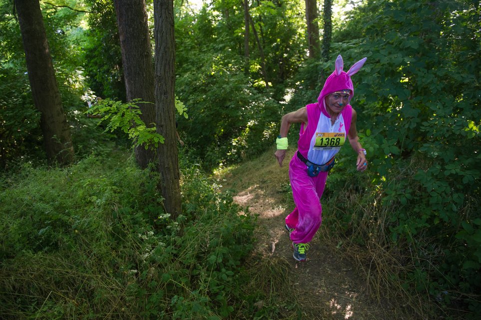 A woman dressed in a rabbit outfit takes part in a 26 Km trail run, the 5th Trail du Kochersberg, on June 13, 2015 in Quatzenheim, eastern France's Alsace region. AFP PHOTO / SEBASTIEN BOZON