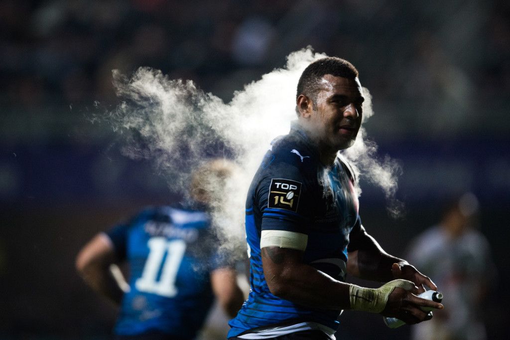 Montpellier's centre Timoci Nagusa uses a pain relief spray during the French Top 14 rugby union match between Montpellier and Clermont at the Altrad stadium in Montpellier, southern France, on October 24, 2015. AFP PHOTO / BERTRAND LANGLOIS