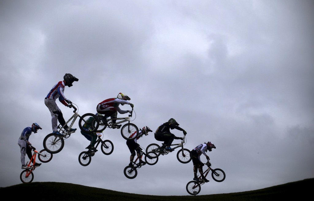 Competitors take part in the International BMX Cycling Challenge at the Rio 2016 Olympic Games BMX cycling track which is part of the X-Park at the Deodoro Sports Complex in Rio de Janeiro, Brazil, October 4, 2015. The International BMX Cycling Challenge is a test event for the Rio 2016 Olympic Games. REUTERS/Ricardo Moraes - RTS2ZW0