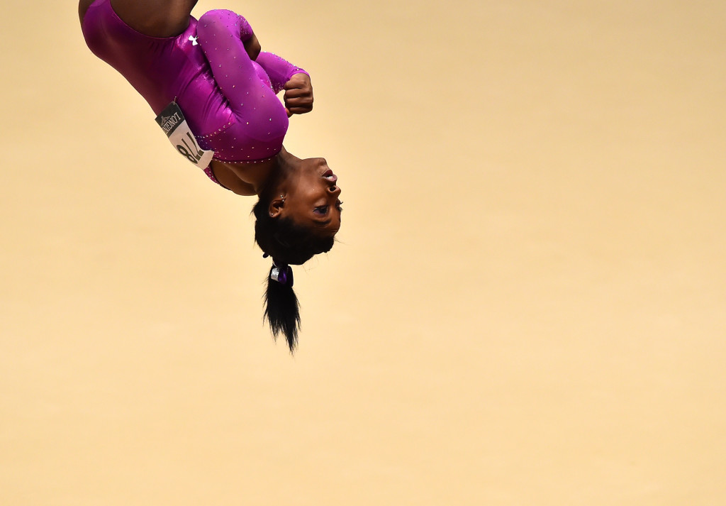 US Simone Biles performs during the Women's Floor Final at the 2015 World Gymnastics Championship in Glasgow, Scotland, on November 1, 2015. AFP PHOTO / BEN STANSALL