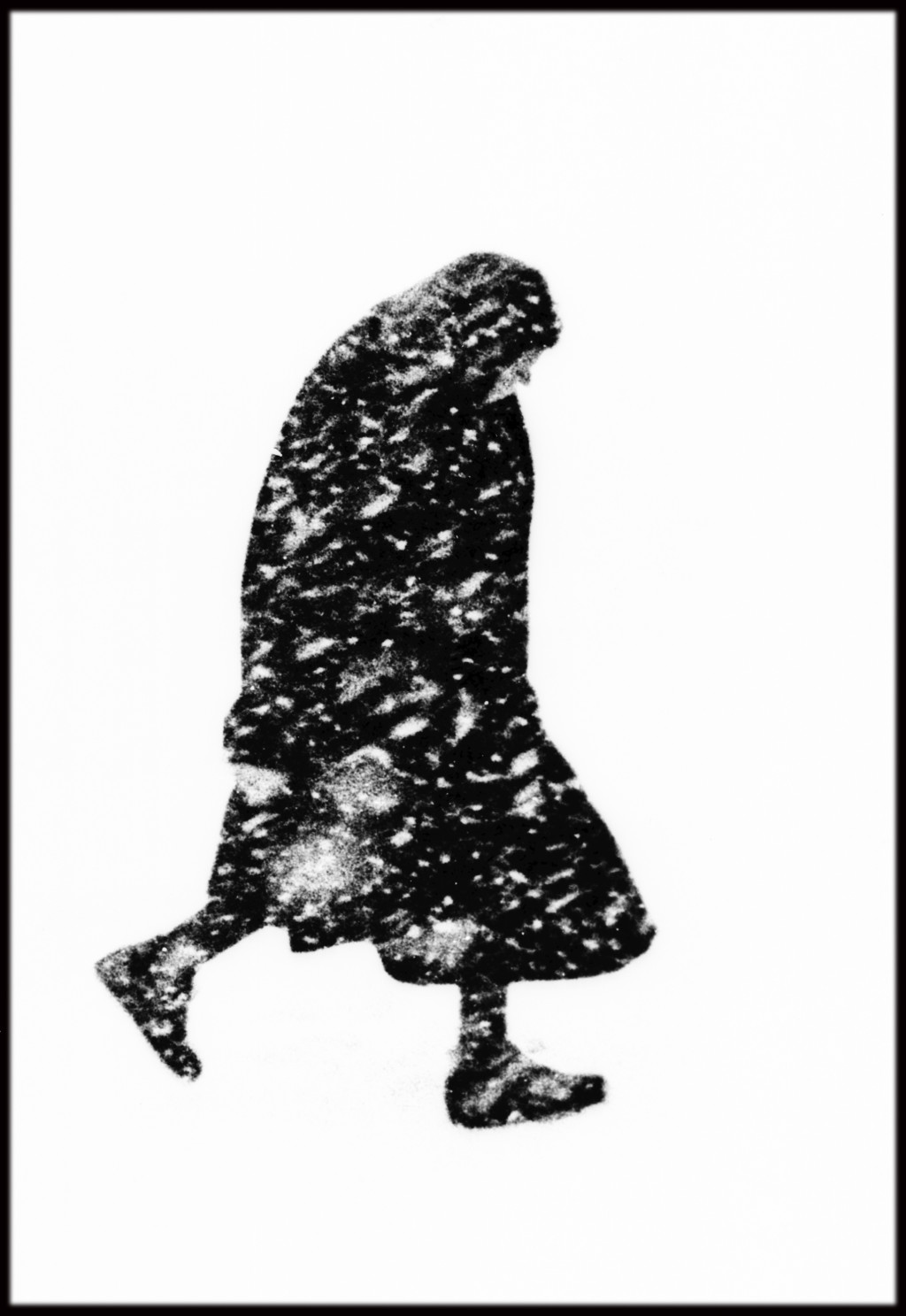 GERMANY, 1954. Hamburg, old woman in a snowstorm.