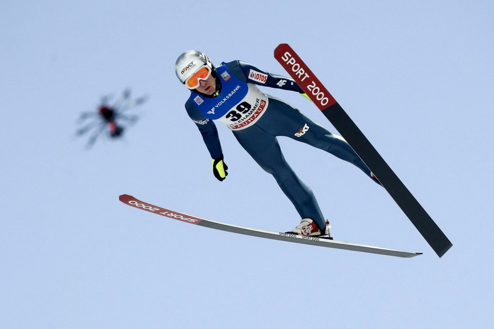 LILLEHAMMER 20151206.World Cup skijump, normal hill: Stefan Hula (POL) in action. Photo drone above him. REUTERS/Cornelius Poppe/NTB ScanpixATTENTION EDITORS - THIS IMAGE WAS PROVIDED BY A THIRD PARTY. FOR EDITORIAL USE ONLY. NOT FOR SALE FOR MARKETING OR ADVERTISING CAMPAIGNS. THIS PICTURE IS DISTRIBUTED EXACTLY AS RECEIVED BY REUTERS, AS A SERVICE TO CLIENTS. NORWAY OUT. NO COMMERCIAL OR EDITORIAL SALES IN NORWAY. NO COMMERCIAL SALES.