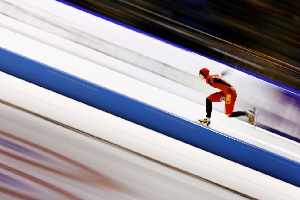 HEERENVEEN, NETHERLANDS - DECEMBER 12: Qishi Li of China competes in the 1000m Ladies race during day two of the ISU World Cup Speed Skating held at Thialf Ice Arena on December 12, 2015 in Heerenveen, Netherlands. (Photo by Dean Mouhtaropoulos/Getty Images) *** BESTPIX ***