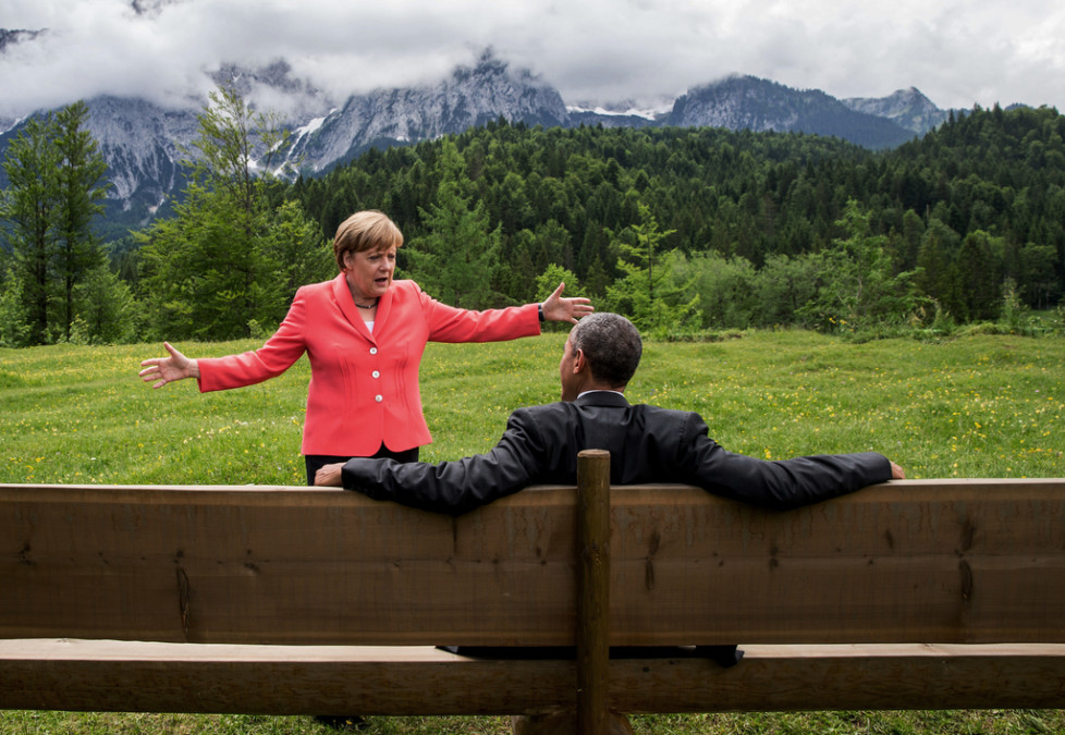 FOR USE AS DESIRED, YEAR END PHOTOS - FILE - German chancellor Angela Merkel speaks with U.S. president Barack Obama at Schloss Elmau hotel near Garmisch-Partenkirchen, southern Germany, Monday June 8, 2015 during the G-7 summit. (Michaek Kappeler/Pool Photo via AP, File)