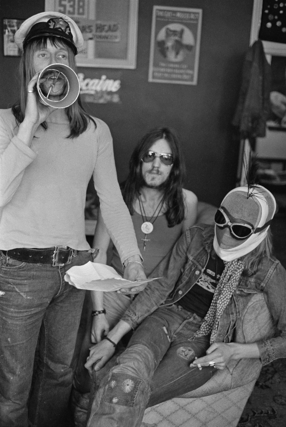 Dave Brock (left) and Ian 'Lemmy' Kilmister, of space rock group Hawkwind, with a masked companion, 17th May 1973. (Photo by Michael Putland/Getty Images)