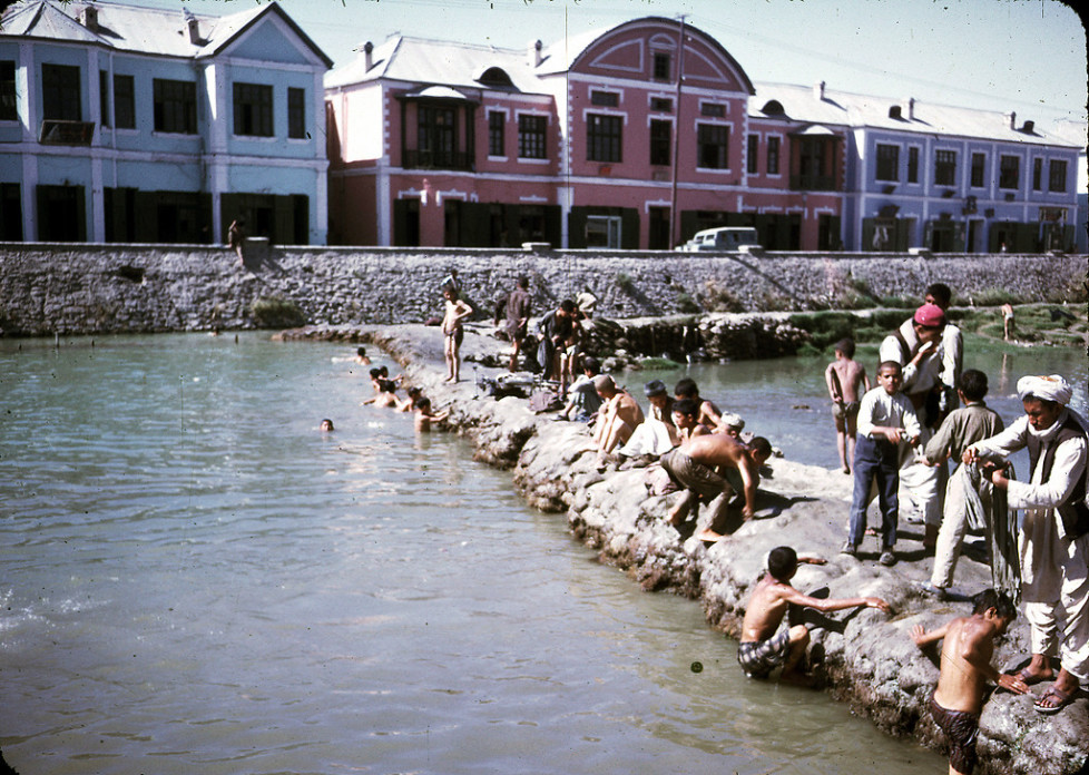 "Men and boys washing and swimming in the Kabul River."