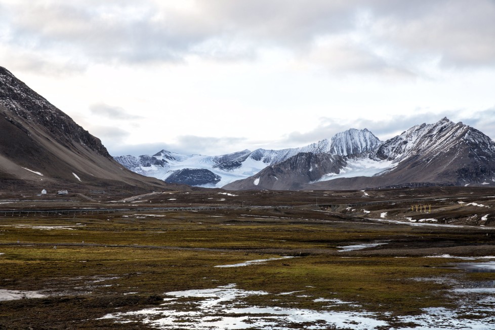 Snow covers Broggerdalen mountain near Ny-Alesund, Svalbard, Norway October 11, 2015. A Norwegian chain of islands just 1,200 km (750 miles) from the North Pole is trying to promote new technologies, tourism and scientific research in a shift from high-polluting coal mining that has been a backbone of the remote economy for decades. Norway suspended most coal mining on the Svalbard archipelago last year because of the high costs, and is looking for alternative jobs for about 2,200 inhabitants on islands where polar bears roam. Part of the answer may be to boost science: in Ny-Alesund, the world's most northerly permanent non-military settlement, scientists from 11 nations including Norway, Germany, France, Britain, India and South Korea study issues such as climate change. The presence of Norway, a NATO member, also gives the alliance a strategic foothold in the far north, of increasing importance after neighbouring Russia annexed Ukraine's Crimea region in 2014. REUTERS/Anna FilipovaPICTURE 18 OF 19 - SEARCH "SVALBARD FILIPOVA" FOR ALL IMAGESâ€¨