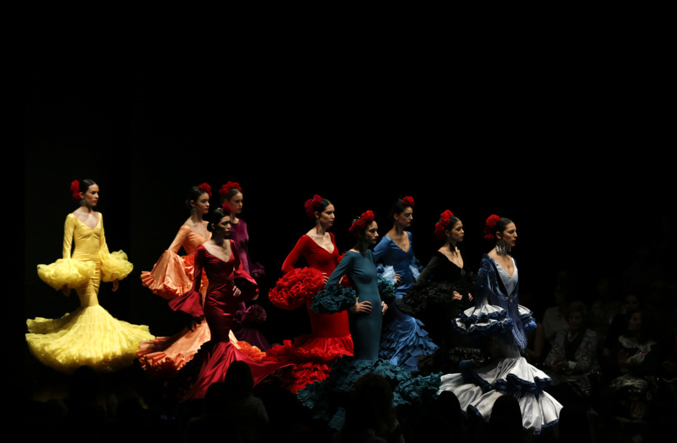 Models present creations by Alejandro Santizo during the International Flamenco Fashion Show SIMOF in the Andalusian capital of Seville, Spain, February 5, 2016. REUTERS/Marcelo del Pozo - RTX25LE2