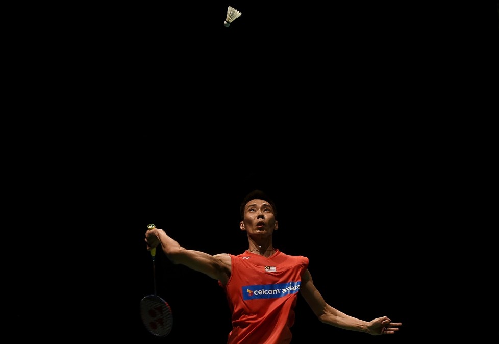 Malaysia's Lee Chong Wei eyes a return against Son Wan Ho of South Korea during their men's singles round match of the 2016 Malaysia Open Badminton Superseries at the Malawati stadium in Shah Alam on April 7, 2017. / AFP PHOTO / MANAN VATSYAYANA