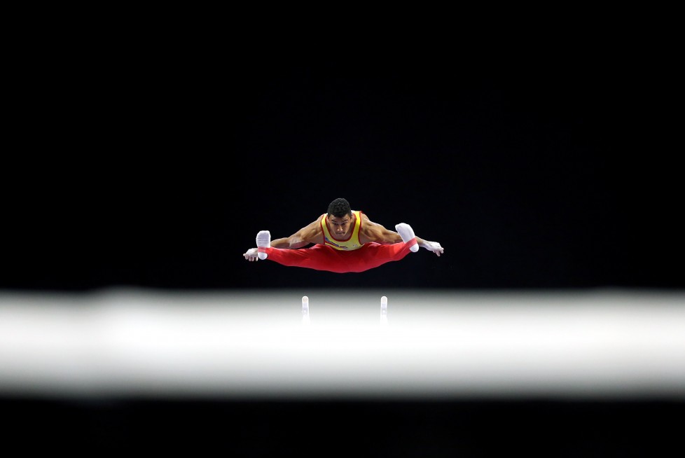 EVERETT, WA - APRIL 10: Javier Sandoval of Columbia competes on the parallel bars during Day 3 of the 2016 Pacific Rim Gymnastics Championships at Xfinity Arena on April 10, 2016 in Everett, Washington. (Photo by Ezra Shaw/Getty Images)