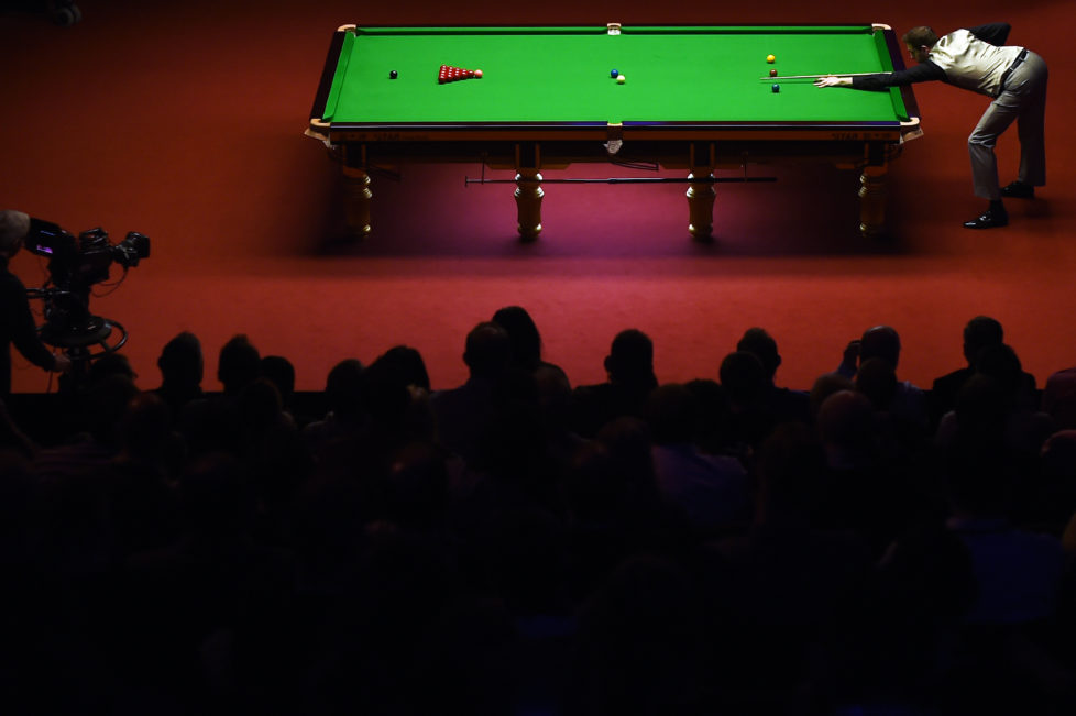 England's Mark Selby plays a shot during the third session of the World Snooker Championship final against China's Ding Junhui at the Crucible theatre, in Sheffield, northern England on May 2, 2016. / AFP PHOTO / PAUL ELLIS