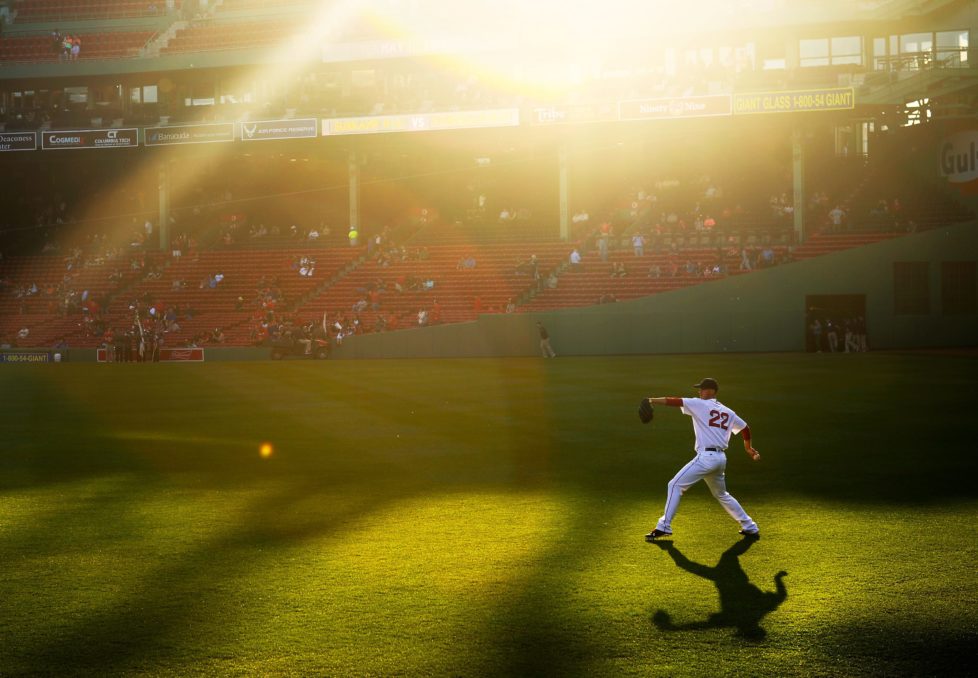 BOSTON, MA - MAY 11: Rick Porcello #22 of the Boston Red Sox warms up in center field before the game against the Oakland Athletics at Fenway Park on May 11, 2016 in Boston, Massachusetts. (Photo by Adam Glanzman/Getty Images) *** BESTPIX ***