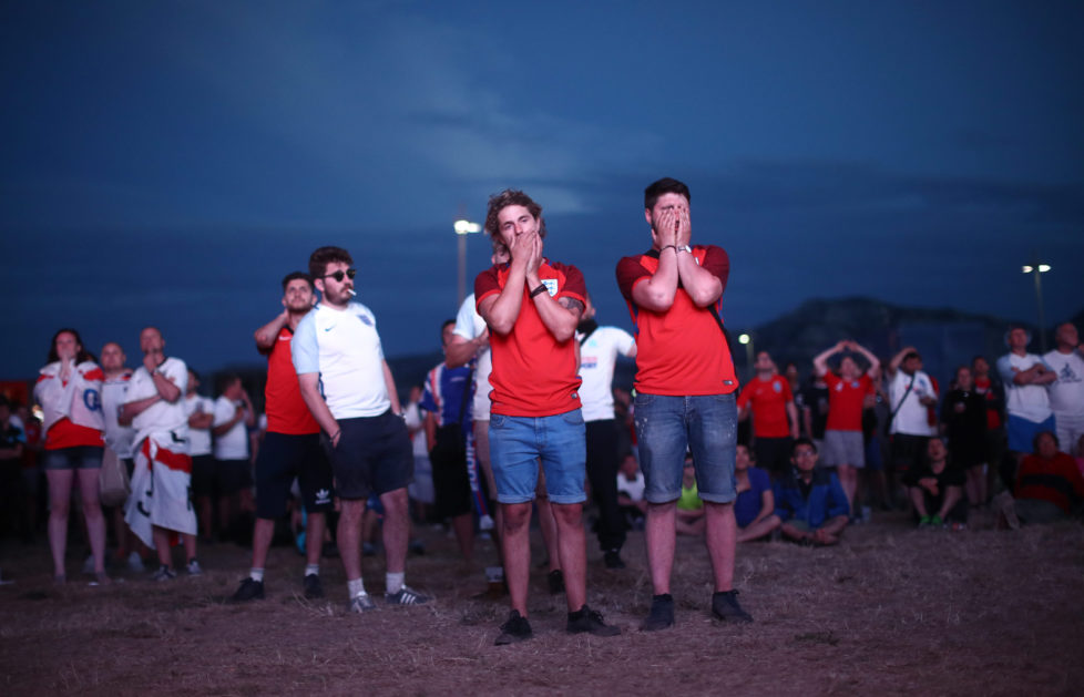 MARSEILLE, FRANCE - JUNE 11: England fans react to the game against Russia at a fanzone on June 11, 2016 in Marseille, France. Football fans from around Europe have descended on France for the UEFA Euro 2016 football tournament. (Photo by Carl Court/Getty Images)