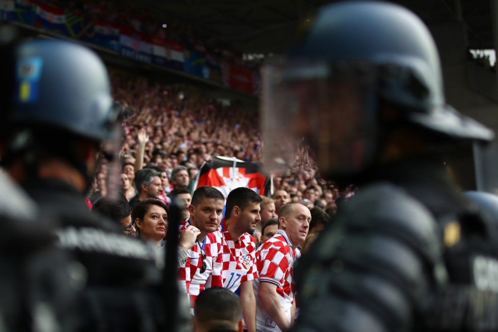 SAINT-ETIENNE, FRANCE - JUNE 17: Riot Police stand infront of the Croatia supporters during the UEFA EURO 2016 Group D match between Czech Republic and Croatia at Stade Geoffroy-Guichard on June 17, 2016 in Saint-Etienne, France. (Photo by Clive Brunskill/Getty Images)