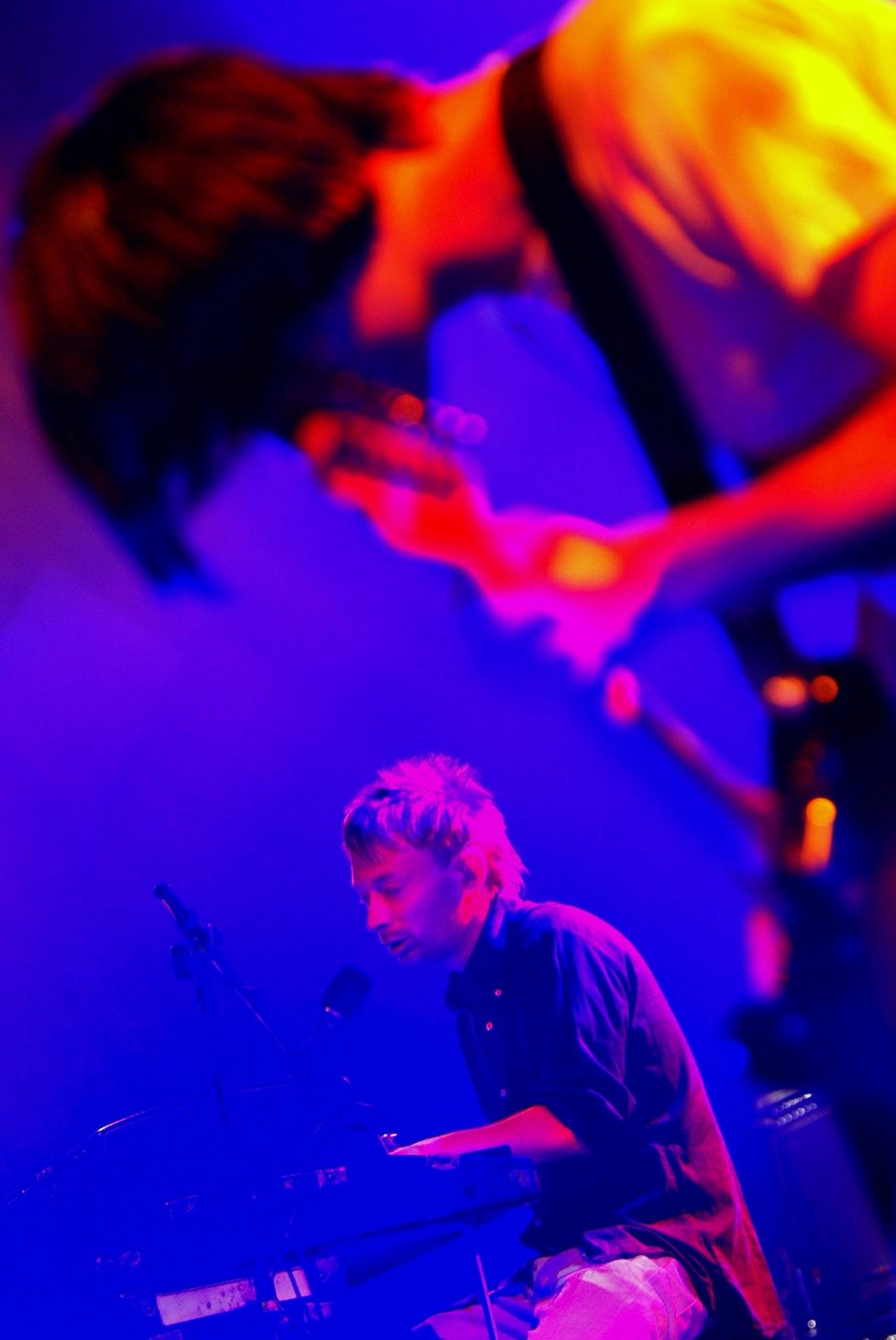 Thom Yorke, left, singer and Jonathan Greenwood, right, guitarist of british rock group Readiohead performs on Stravinsky stage, during the 37th Montreux Jazz Festival, in Montreux, Switzerland, Saturday, July 5, 2003. (KEYSTONE/Fabrice Coffrini)