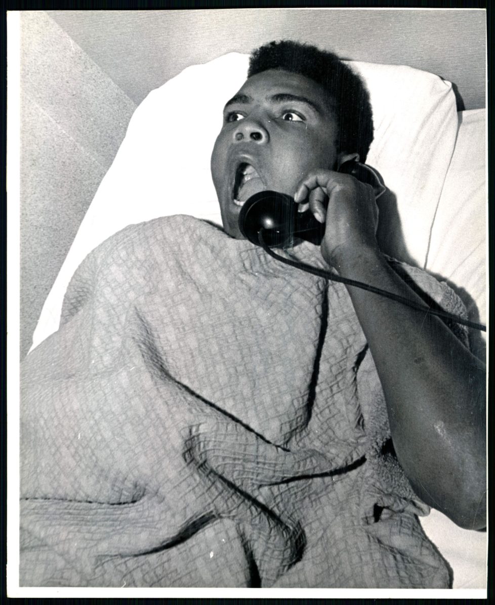 NOV 5 1963; ALI, MUHAMMAD - INDIVIDUALS; "I AM THE GREATEST. WHAT TIME IS IT?"; After a night of making Denver, and Sonny Liston in particular, aware of his presence. Cassius Clay and troupe found accomodations at the Albany Hotel. The Denver Post caught him in bad Tuesday morning asking for the time of day and telling hotel employees what a great night he had Monday on the Liston home's front lawn. (Photo By The Denver Post via Getty Images)