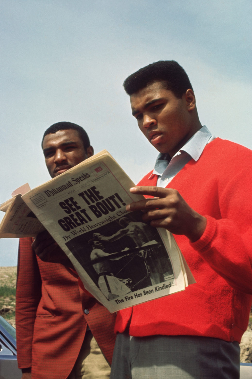 UNDATED: Muhammad Ali reads about his boxing match in the paper circa 1960's. (Photo by Focus on Sport/Getty Images)