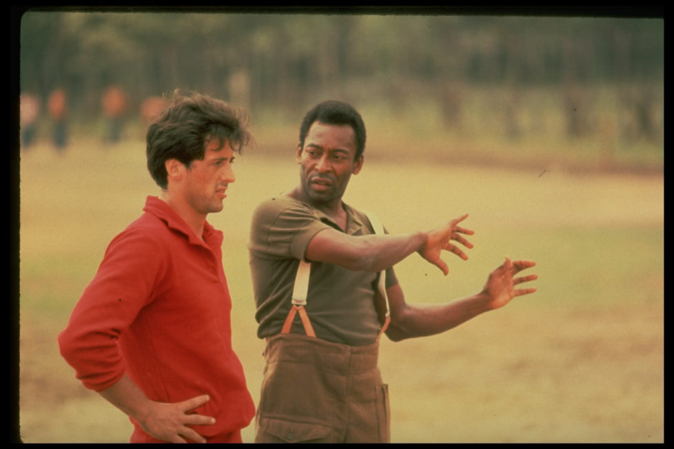 (L-R) Actor Sylvester Stallone getting pointers fr. soccer great Pele during filming of motion picture Escape to Victory. (Photo by John Bryson/The LIFE Images Collection/Getty Images)
