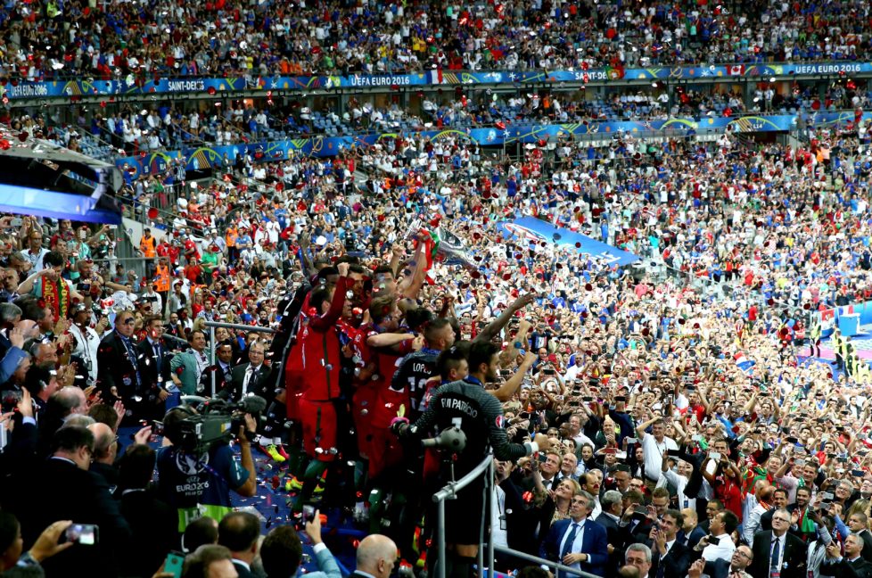 PARIS, FRANCE - JULY 10: Portugal players celebrate after their side win 1-0 against France during the UEFA EURO 2016 Final match between Portugal and France at Stade de France on July 10, 2016 in Paris, France. (Photo by Alex Livesey/Getty Images)