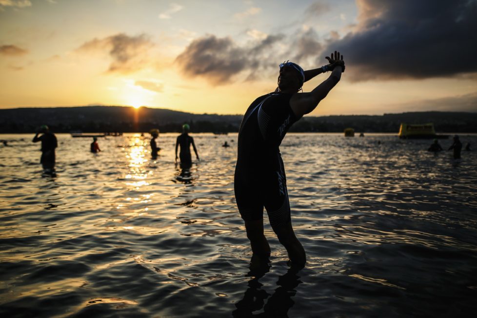 ZURICH, SWITZERLAND - JULY 24: (EDITORS NOTE - digital filters were used in the creation of this image) Athlets prepare for the swim leg before Ironman Zurich on July 24, 2016 in Zurich, Switzerland. (Photo by Joern Pollex/Getty Images)