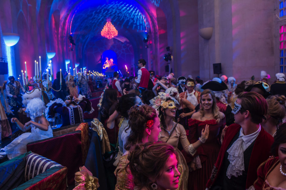 Costumed guests dance during the Great Masked Bal, in the Orangerie of the Versailles castle, west of Paris, Saturday, June 27, 2015. On the occasion of the tercentenary of King Louis XIVs death, who died on Sept.1, 1715, a fountains show and a costumed ball took place in the castle.(AP Photo/Kamil Zihnioglu)