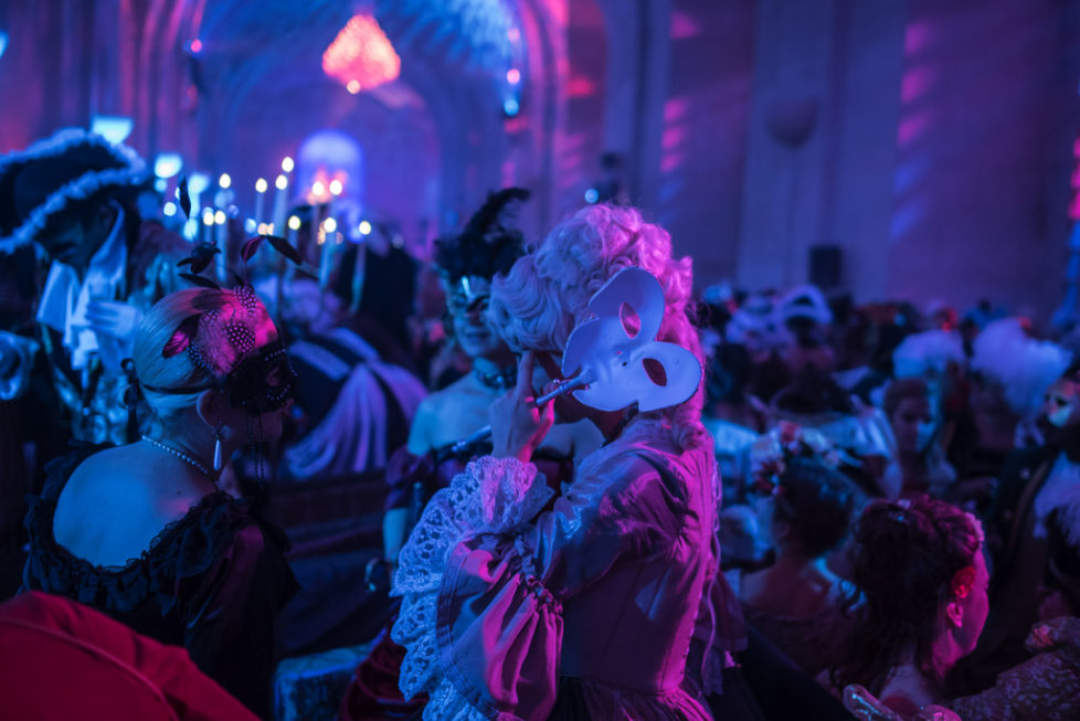Costumed guests dance during the Great Masked Bal, in the Versailles castle, west of Paris, Saturday, June 27, 2015. On the occasion of the tercentenary of King Louis XIVs death, who died on Sept.1, 1715, a fountains show and a costumed ball took place in the castle.(AP Photo/Kamil Zihnioglu)
