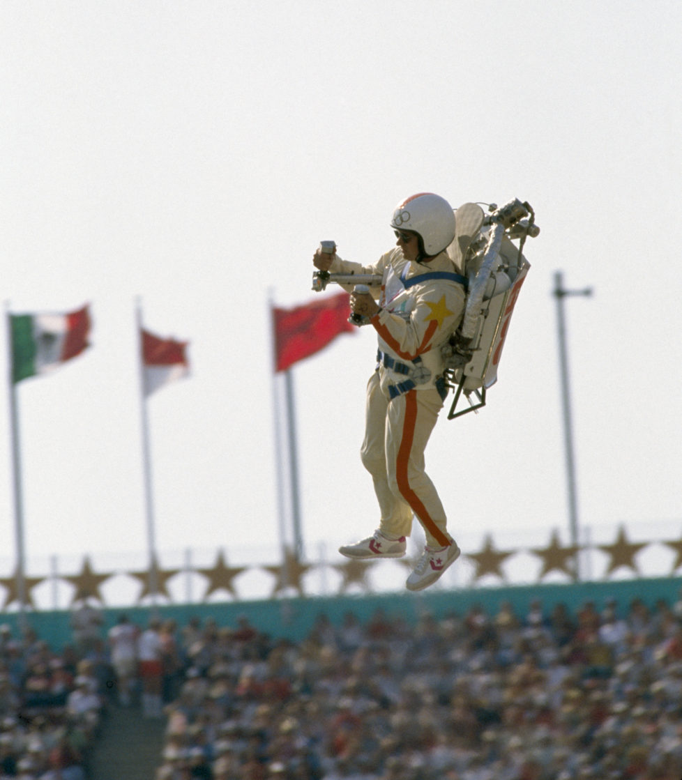 Bill Suitor wears a jet pack (or rocket pack) to propel himself into the Memorial Coliseum during the opening ceremony of the 1984 Summer Olympics in Los Angeles, United States on 28th July 1984. (Photo by Bob Thomas/Getty Images) *** Local Caption *** Bill Suitor