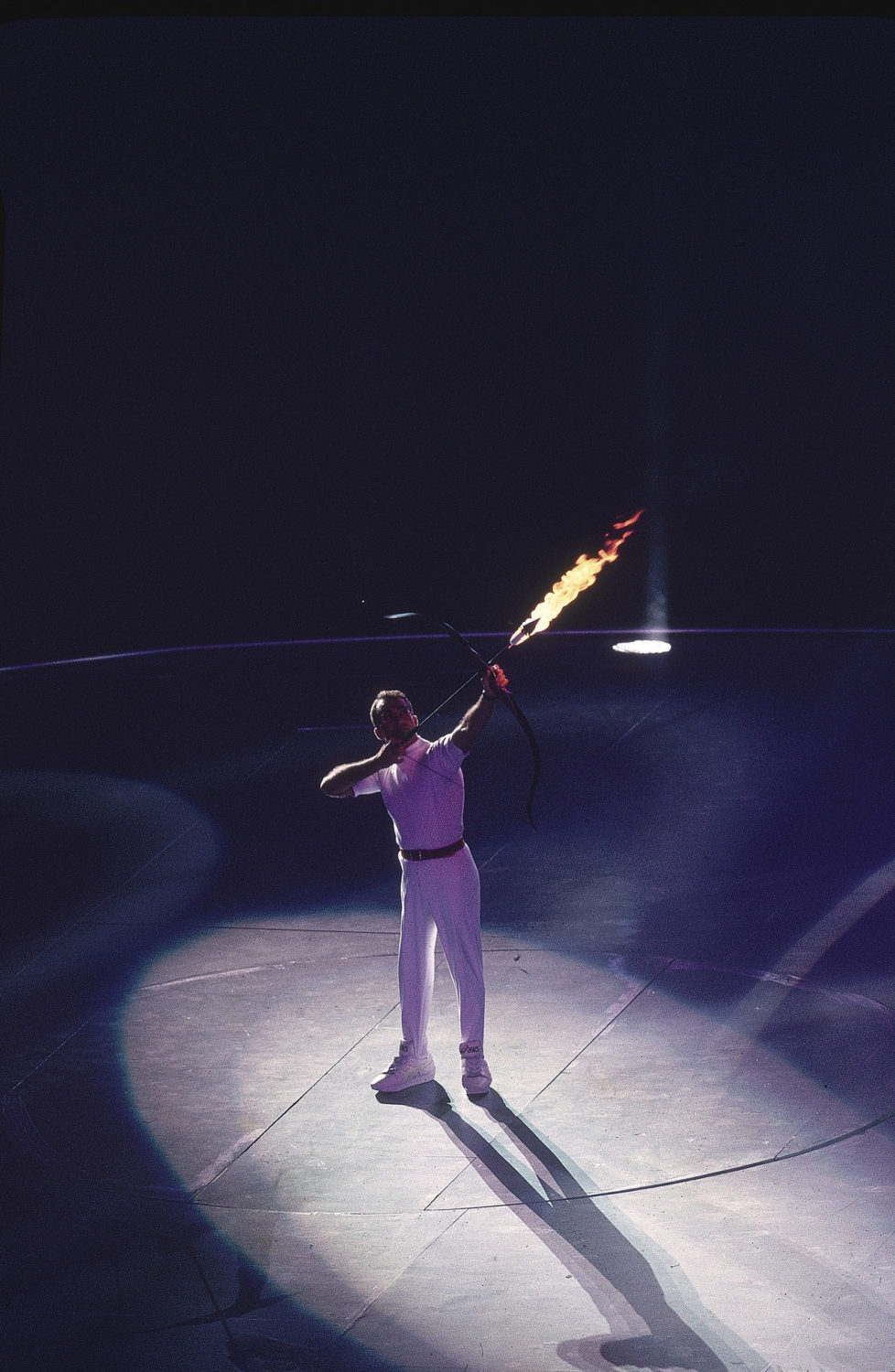 SPAIN - JULY 25: Opening Ceremony: 1992 Summer Olympics, Paralympic archer Antonio Rebollo shooting lit arrow and lighting flame at Olympic Stadium, Barcelona, Spain 7/25/1992 (Photo by Peter Read Miller/Sports Illustrated/Getty Images) (SetNumber: X43182 TK1 R5 F34)