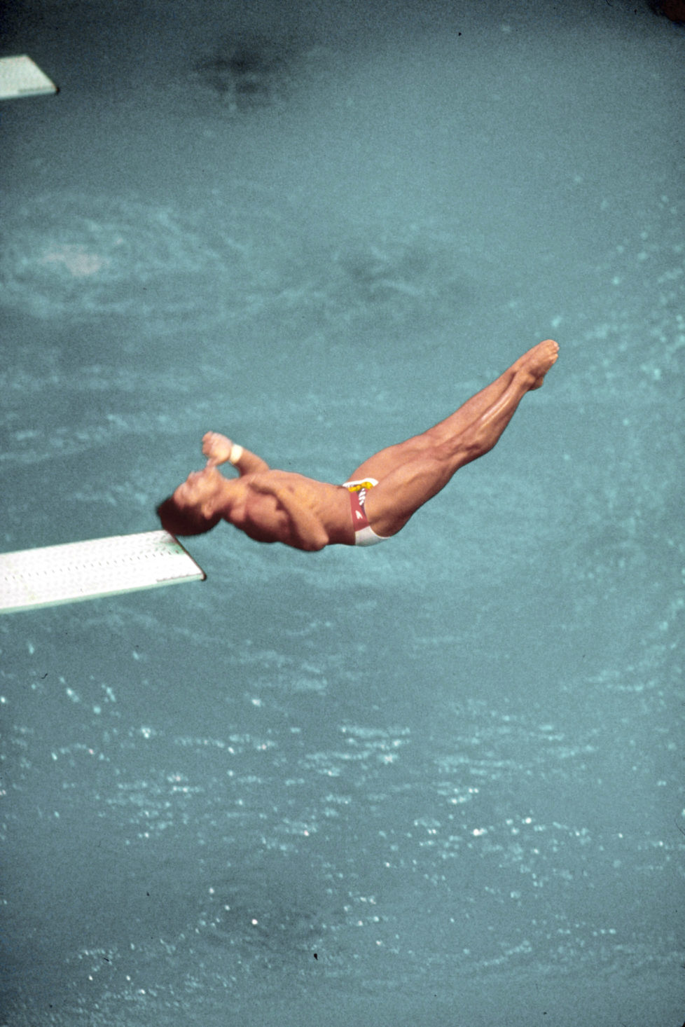 US diver Greg Louganis making dive during which he hit his head on the board while competing in Olympics. (Photo by Rich Clarkson/The LIFE Images Collection/Getty Images)
