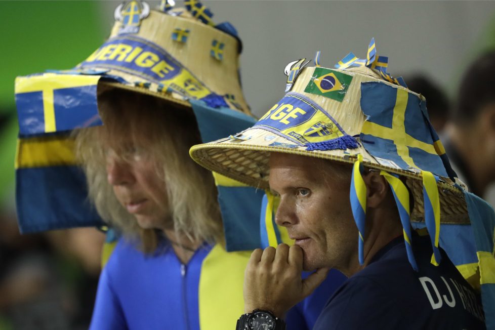 Swedish supporters watch the women's quarterfinal handball match between Sweden and Norway at the 2016 Summer Olympics in Rio de Janeiro, Brazil, Tuesday, Aug. 16, 2016. (AP Photo/Matthias Schrader)