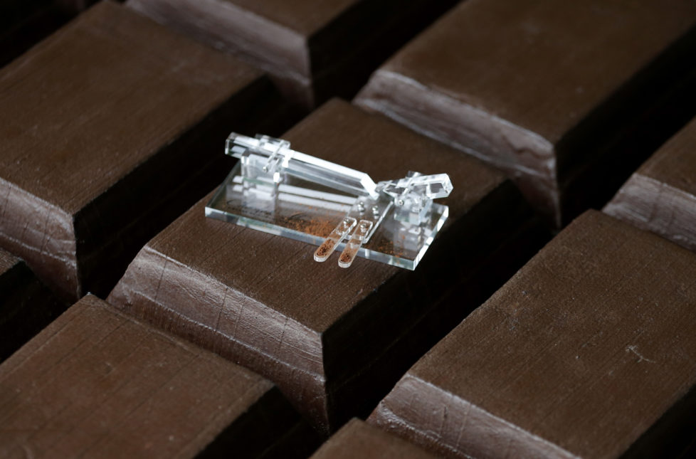 The Chocolate Shooter is displayed in the factory of Belgian chocolatier Dominique Persoone in Bruges, February 3, 2015. When Belgian chocolatier Dominique Persoone created a chocolate-sniffing device for a Rolling Stones party in 2007, he never imagined demand would stretch much beyond the rock 'n' roll scene. But, seven years later, he has sold 25,000 of them. Inspired by a device his grandfather used to propel tobacco snuff up his nose, Persoone created a 'Chocolate Shooter' to deliver a hit of Dominican Republic or Peruvian cocoa powder, mixed with mint and either ginger or raspberry. Picture taken on February 3, 2015. REUTERS/Francois Lenoir (BELGIUM - Tags: FOOD SOCIETY) - RTR4OIJ5