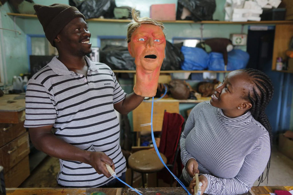 epa05548731 (13/19) A puppet maker holds up the Donald Trump puppet as he controls its eye movement at a puppet workshop near the studio where the shooting of the 11th season of 'The XYZ Show' satirical puppet show takes place in Nairobi, Kenya, 23 August 2016. The XYZ Show is Kenya’s popular satirical television program and has been taking pokes at the country’s political elites and international figures ever since it aired its first episode in 2009. With the 2016 US presidential elections, the show is now taking on Republican Presidential candidate Donald Trump. EPA/DAI KUROKAWA PLEASE REFER TO ADVISORY NOTICE (epa05548718) FOR FULL FEATURE TEXT