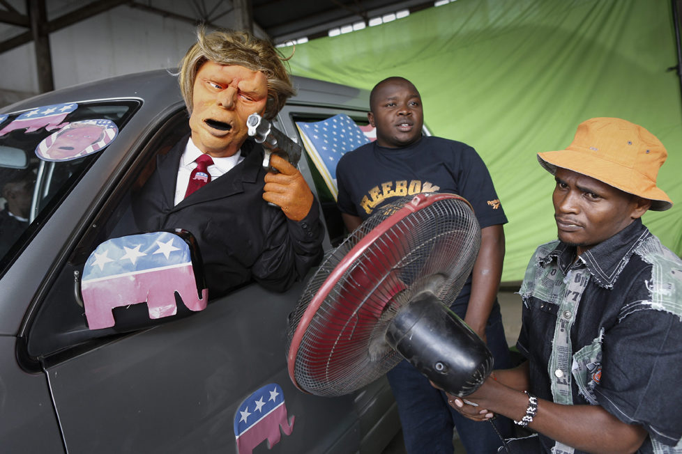epa05548722 (04/19) A prodution assistant (R) uses a fan to lift up the hair of the Donald Trump puppet during the shooting of the 11th season of 'The XYZ Show' satirical puppet show at a studio in Nairobi, Kenya, 31 August 2016. The XYZ Show is Kenya‚Äôs popular satirical television program and has been taking pokes at the country‚Äôs political elites and international figures ever since it aired its first episode in 2009. With the 2016 US presidential elections, the show is now taking on Republican Presidential candidate Donald Trump. EPA/DAI KUROKAWA PLEASE REFER TO ADVISORY NOTICE (epa05548718) FOR FULL FEATURE TEXT