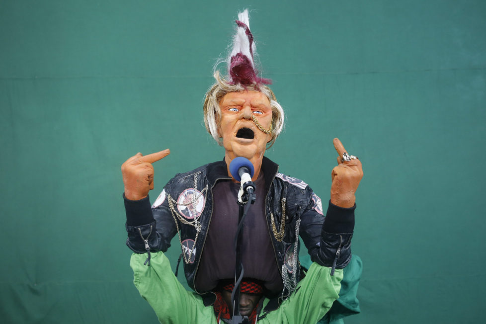 epa05548735 (17/19) Puppeteers control the Donald Trump puppet dressed as a punk rock star and singing the remix of 'God Save The Queen' by the Sex Pistols during the shooting of the 11th season of 'The XYZ Show' satirical puppet show at a studio in Nairobi, Kenya, 30 August 2016. The XYZ Show is Kenya‚Äôs popular satirical television program and has been taking pokes at the country‚Äôs political elites and international figures ever since it aired its first episode in 2009. With the 2016 US presidential elections, the show is now taking on Republican Presidential candidate Donald Trump. EPA/DAI KUROKAWA PLEASE REFER TO ADVISORY NOTICE (epa05548718) FOR FULL FEATURE TEXT