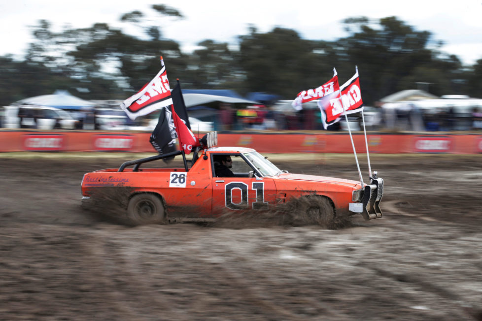 Robert Dowse, 35, from Frankston in the Australian state of Victoria powers his Australian 'ute' he calls "General Lee" through thick mud during a 'circle work' competition of vehicle handling skills at the Deni Ute Muster in Deniliquin, New South Wales, September 30, 2016. REUTERS/Jason Reed SEARCH "UTE CULTURE" FOR THIS STORY. SEARCH "THE WIDER IMAGE" FOR ALL STORIES.