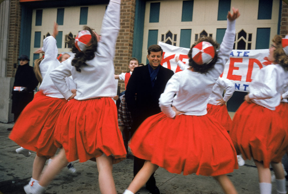 WISCONSIN, UNITED STATES - MARCH 1960: Presidential hopeful, Senator John F. Kennedy (Dem-MA), getting a cheer from high school girls while campaigning in Wisconsin. (Photo by Stan Wayman/The LIFE Picture Collection/Getty Images)