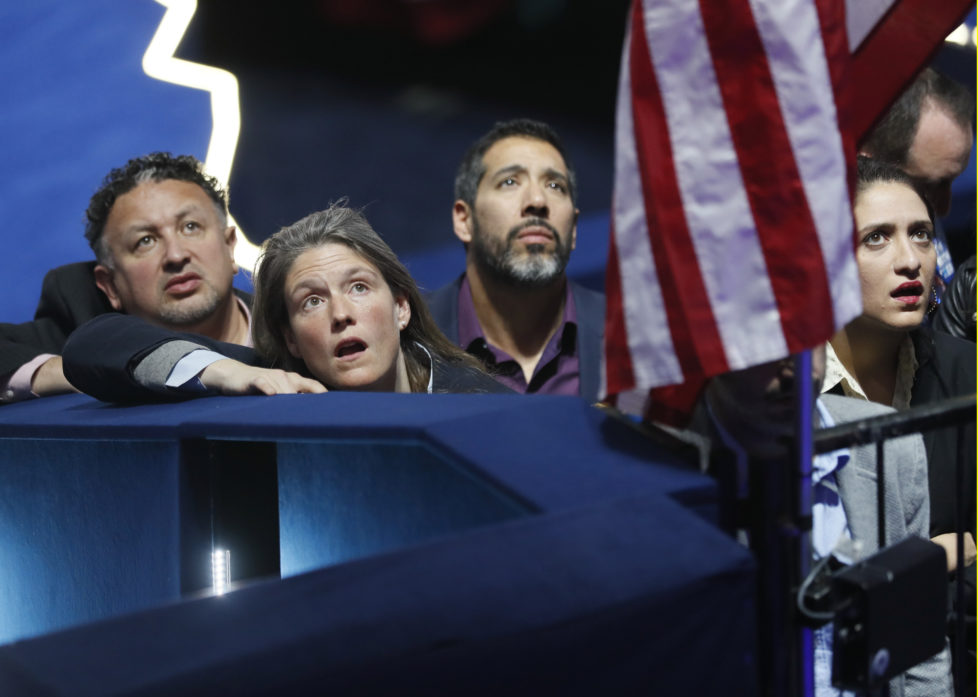 Supporters of Democratic U.S. presidential nominee Hillary Clinton watch results at the election night rally in New York, U.S., November 8, 2016. REUTERS/Rick Wilking - RTX2SNYH