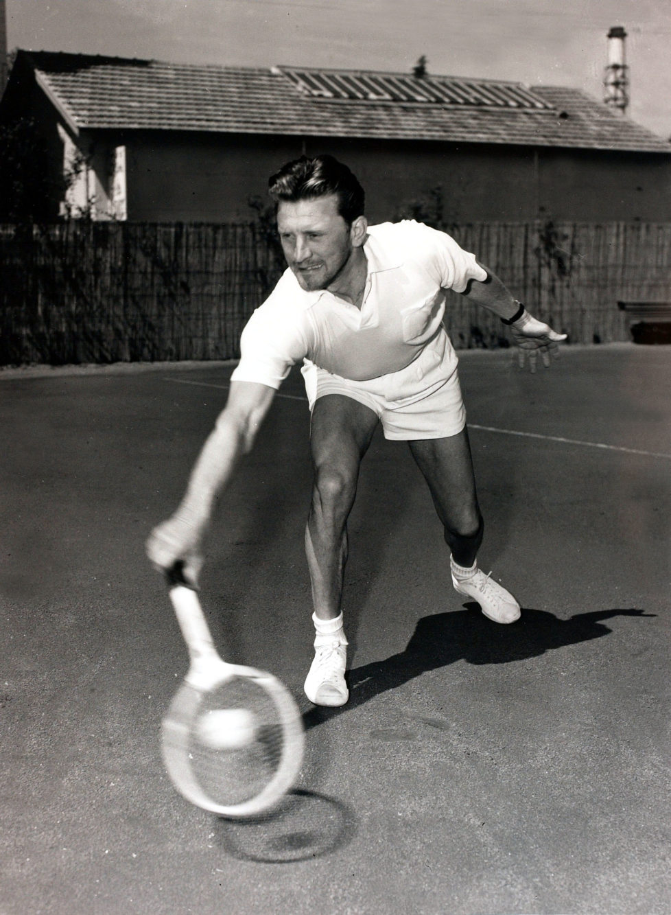 Cinema Personalities, pic: 18th April 1953, American film actor Kirk Douglas pictured playing tennis in Cannes, South of France (Photo by Popperfoto/Getty Images)
